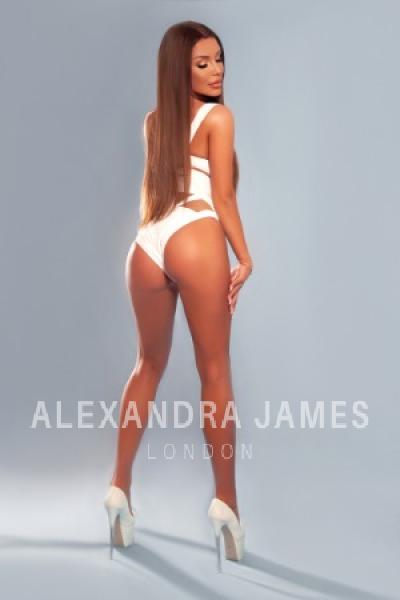 Jessica showing off her ass in a white bikini